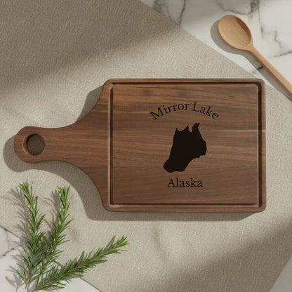 lifestyle image of Mirror Lake Alaska Engraved Cutting Board
