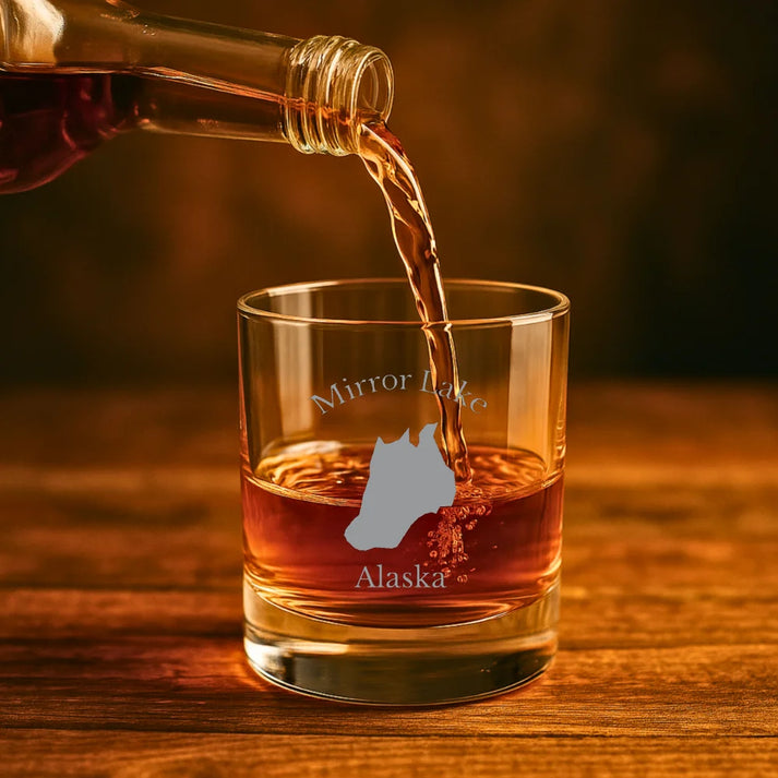 lifestyle image of Mirror Lake Alaska Engraved Whiskey Glass