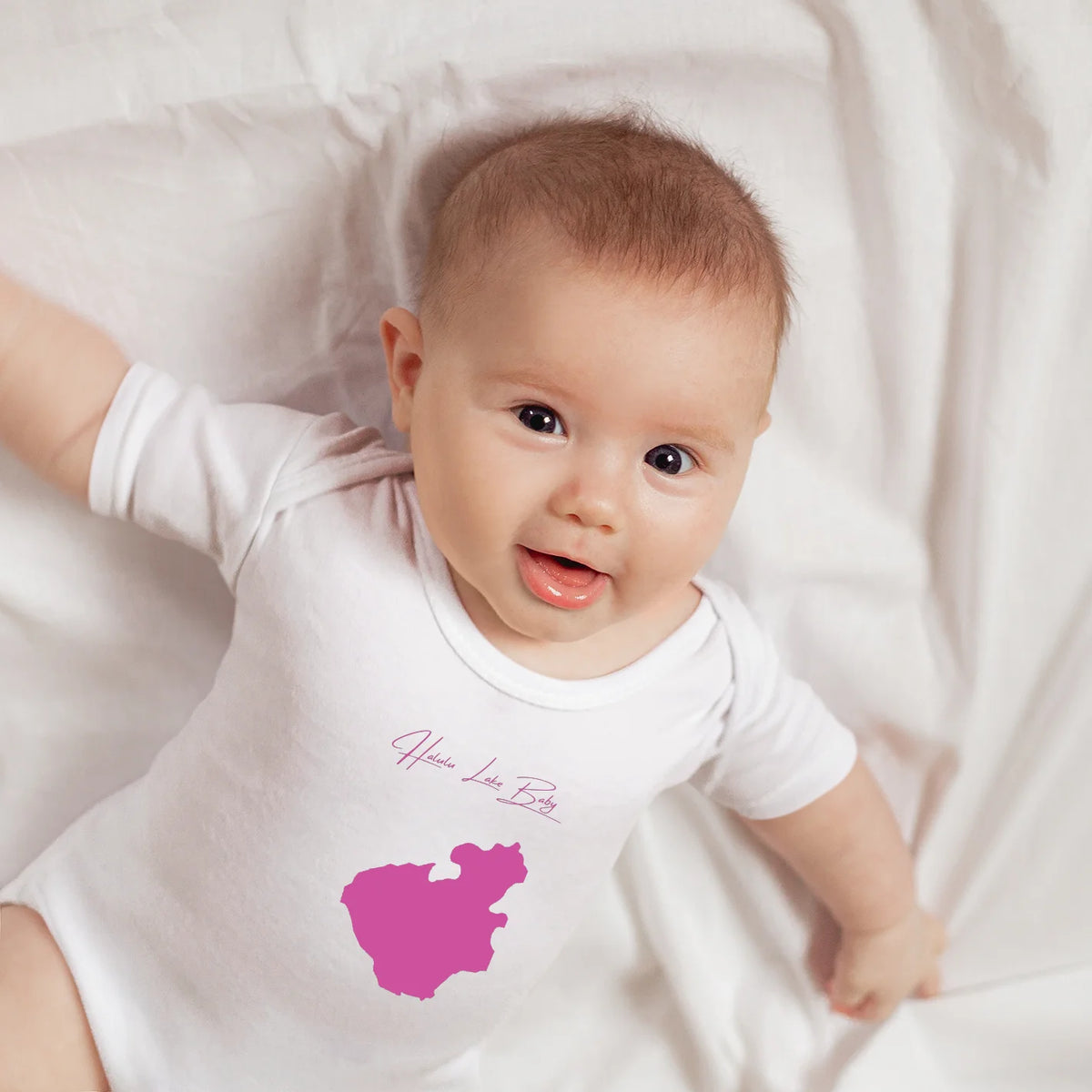lifestyle image of Halulu Lake Hawaii Onesie