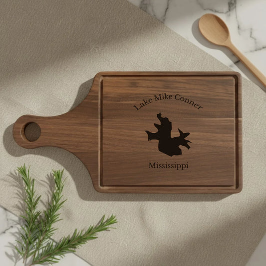 lifestyle image of Lake Mike Conner Mississippi Engraved Cutting Board