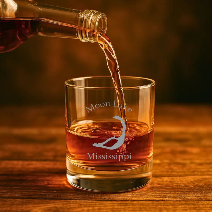 lifestyle image of Moon Lake Mississippi Engraved Whiskey Glass