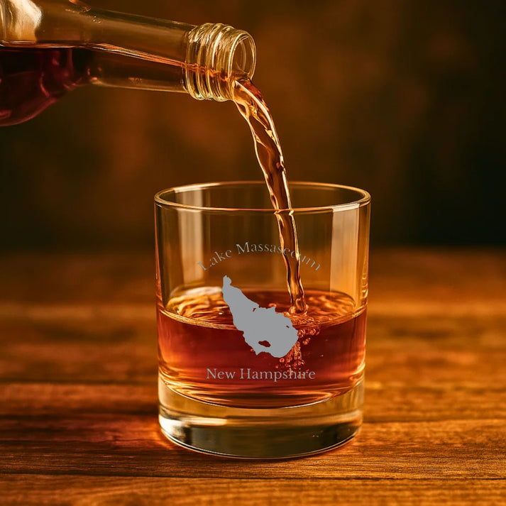 lifestyle image of Lake Massasecum New Hampshire Engraved Whiskey Glass