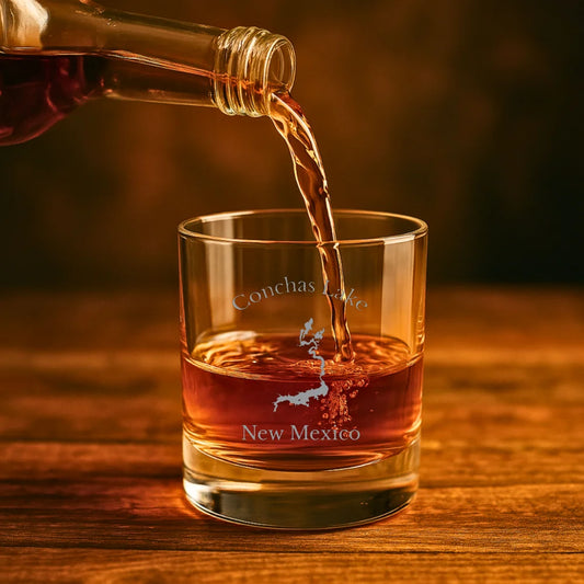 lifestyle image of Conchas Lake New Mexico Engraved Whiskey Glass