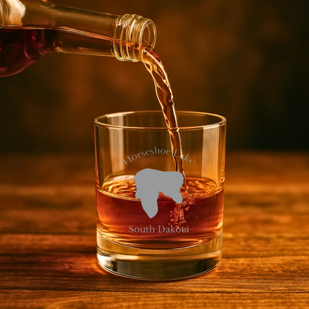 lifestyle image of Horseshoe Lake South Dakota Engraved Whiskey Glass
