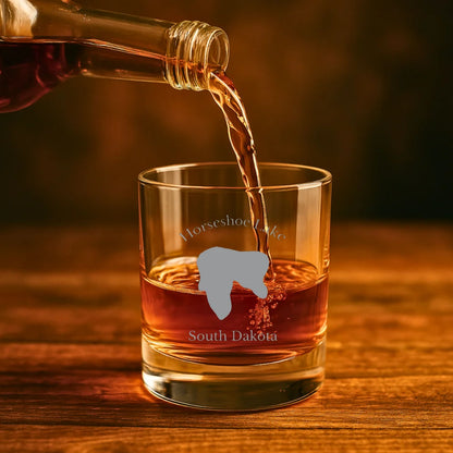 lifestyle image of Horseshoe Lake South Dakota Engraved Whiskey Glass
