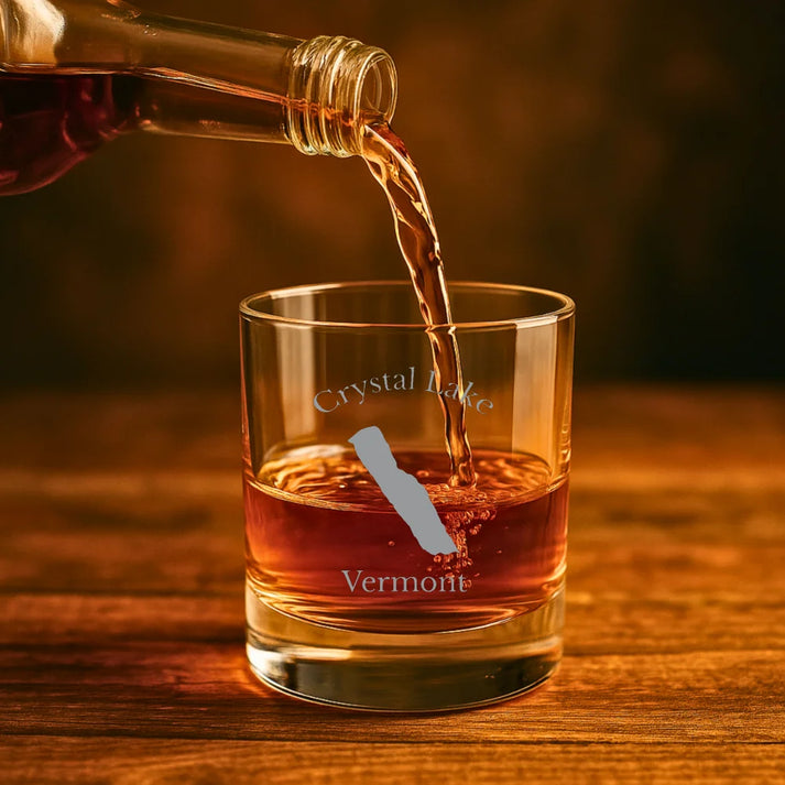 lifestyle image of Crystal Lake Vermont Engraved Whiskey Glass