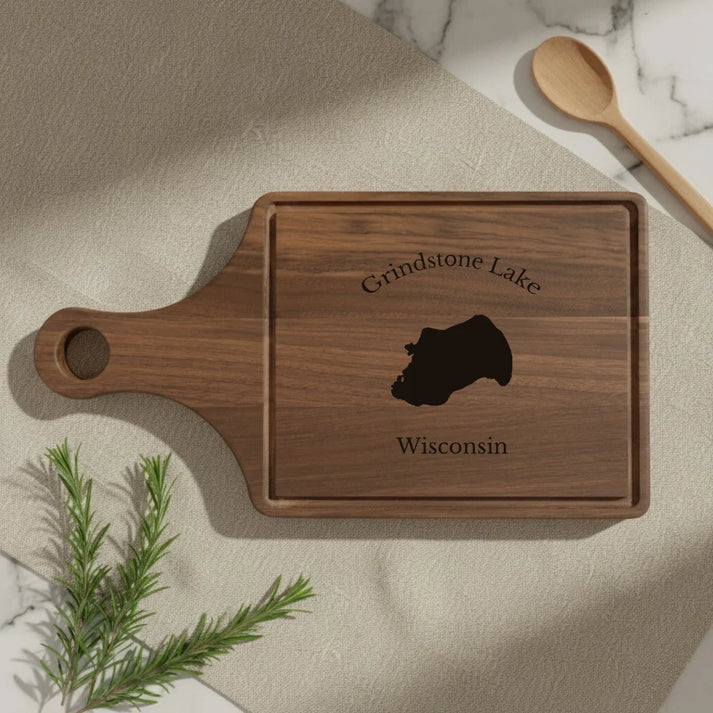 lifestyle image of Grindstone Lake Wisconsin Engraved Cutting Board